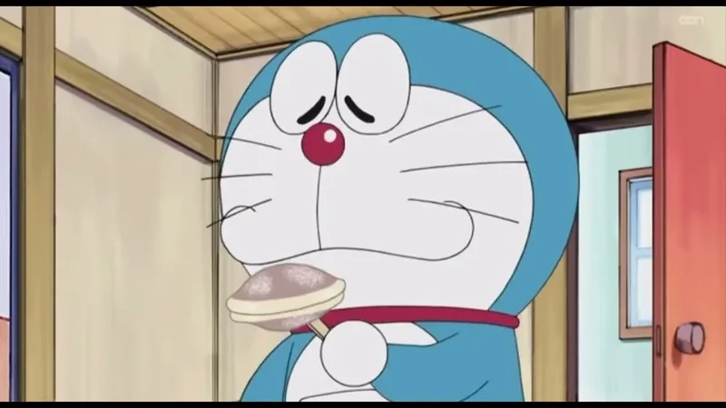 Phiên bản Doraemon ăn bánh rán cute làm tan chảy trái tim